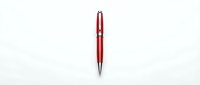 Red metallic ballpoint pen isolated on white background for office supplies and writing instruments design projects.