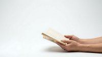 Hands holding gold smartphone with blank screen on white background for mobile app mockup and digital communication design.