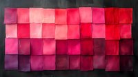 Gradient pattern of red and pink watercolor squares arranged in rows on dark background creates modern geometric abstract art composition for wall decor.