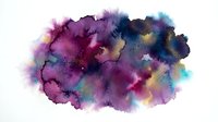 Abstract watercolor splash with vibrant purple, blue and gold colors creating artistic paint texture for creative design projects and backgrounds.