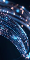 Glowing blue fiber optic cables with bokeh light effect against dark background, creating futuristic technology atmosphere for digital connectivity concepts.