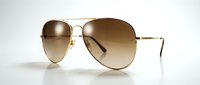 Gold-toned aviator sunglasses with gradient brown lenses isolated on white background, suitable for fashion, retail, and e-commerce design projects.