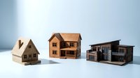 Wooden architectural house models showcasing different home styles and sizes arranged on clean white surface for real estate and construction concepts.