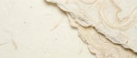 Creamy beige foundation makeup smear texture on white background. Cosmetic product sample with smooth blended strokes for beauty and skincare design.