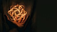 Hands cupping glowing abstract light orb with swirling energy patterns against dark background for spiritual and mystical concepts.