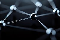 Metallic spheres connected by silver rods forming molecular structure network on dark background, illustrating connectivity and scientific research concept.