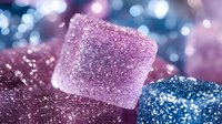 Sparkling sugar cubes in pink and blue tones with bokeh background, creating festive mood for party decoration or sweet confectionery concept.
