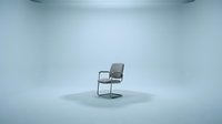 Modern gray cantilever chair with metal frame isolated on white background, suitable for interior design, furniture catalogs, and architectural visualization projects.