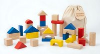 Colorful wooden building blocks set with geometric shapes for children's educational play and creative construction on white background.