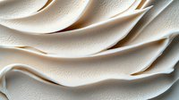 Elegant cream-colored waves form abstract curved layers with soft textured surfaces, creating flowing organic shapes in light and shadow for luxury backgrounds.