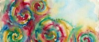 Abstract watercolor swirls in vibrant rainbow colors creating dynamic spiral patterns on textured paper background for artistic design projects.