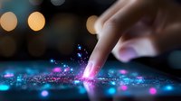Magical finger touch creating glowing splash with pink and blue sparkles on dark background with bokeh lights. Concept of digital transformation and innovation.