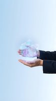 Businessman in suit holding glowing holographic blocks labeled skills and expertise, symbolizing professional growth and knowledge management.