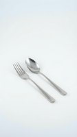 Stainless steel fork and spoon set isolated on white background for kitchen dining and restaurant use.
