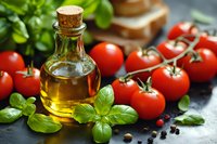 Fresh cherry tomatoes on vine with olive oil bottle and aromatic basil leaves on dark stone background. Mediterranean cuisine ingredients.