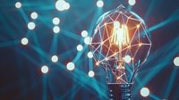 Glowing light bulb with geometric polygon wire mesh pattern against blue technology network background with bokeh lights and digital connections.