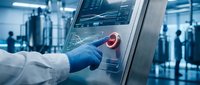 Scientist in white coat and blue glove pressing glowing red start button on industrial control panel in modern laboratory.