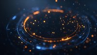 Futuristic glowing circular technology interface with orange and blue light particles on dark background, creating a digital holographic effect.
