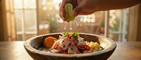 Young chef with medium skin tone squeezing fresh lime over colorful salad bowl in bright kitchen with window light, perfect for food blogs and culinary content.