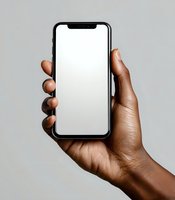 African American hand holding smartphone with blank white screen against neutral gray background for mockup or app design presentation.