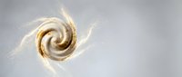 Golden spiral galaxy with luminous trails and stardust particles on soft gray background for cosmic design projects and space-themed artwork.