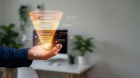 Marketing sales funnel hologram with awareness, interest, decision, action stages held by male hand in modern office setting.