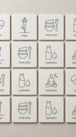Minimalist wellness lifestyle cards with line art icons for yoga, meal prep, hydration and relaxation habits arranged in organized grid pattern.