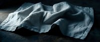 Realistic asteroid floating in dark space with detailed rocky surface texture and dramatic lighting for science fiction projects.