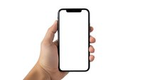 Hand holding modern smartphone with blank white screen isolated on white background for mockup design and app presentation.