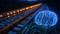 Glowing digital brain with circuit pattern over railroad tracks at dusk, orange lights illuminate railway into distance creating futuristic technology concept.