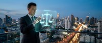 Asian businessman in suit using holographic justice scales interface on city rooftop at dusk. Legal technology concept for law firms and digital transformation.