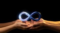 Two hands holding glowing blue infinity symbol against dark background, representing endless possibilities, unity, and continuous growth for business and technology concepts.