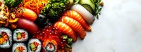 Assorted Japanese sushi platter with fresh nigiri, maki rolls, sashimi, and colorful vegetables on marble background.