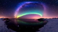 Spectacular northern lights aurora borealis over frozen lake at night with starry sky, in calm water surface.