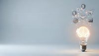Glowing light bulb with floating business icons representing innovation, creativity, and entrepreneurial ideas on clean background.