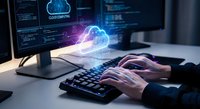 Hands typing on keyboard with glowing cloud computing hologram above, representing digital transformation and modern technology solutions.