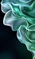 Ethereal flowing smoke forms in turquoise and mint green colors against dark background create abstract fluid art pattern with gentle curves and light effects.