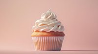 Single vanilla cupcake with swirled white buttercream frosting on soft pink background, minimalist food photography style for bakery marketing and menu design.
