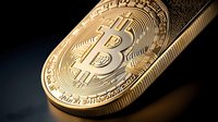 Golden cryptocurrency coin with bitcoin symbol on dark background, macro shot showing detailed texture and metallic surface. Digital payment concept.