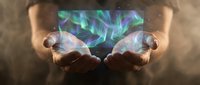 Hands holding glowing holographic display with vibrant neon light patterns, futuristic technology concept for digital innovation and virtual reality applications.