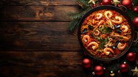 Festive seafood paella with shrimp and mussels in traditional pan on rustic wooden background with Christmas decorations, red baubles and pine branches.