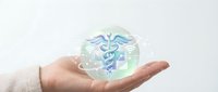 Young adult hand holding glowing medical caduceus symbol with digital healthcare icons, representing telemedicine, health technology, and medical innovation for web and app design.