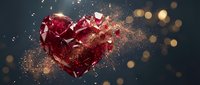 Shattered red crystal heart exploding into fragments with golden sparkles and bokeh lights on dark background for romantic designs.