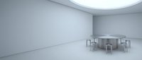 Minimalist dining space with metal table and chairs in empty white room with curved ceiling and soft natural light.