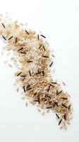 Mixed rice and wild rice grains scattered on white background. Isolated ingredient for cooking, nutrition, food packaging, recipe blogs, culinary design, and healthy eating content.