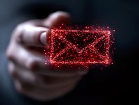 Glowing red envelope icon made of sparkling particles floating above extended hand against dark background, representing digital communication and mail service.