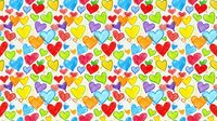 Colorful hearts seamless pattern with vibrant rainbow colors on white background. Repeating romantic design tiles perfectly for wallpaper, fabric, wrapping paper.
