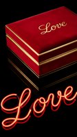 Luxury red velvet gift box with gold trim and Love inscription beside glowing neon script on dark background for Valentine's Day.
