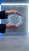 Hands holding glowing digital sphere with connected network lines, representing technology, innovation, data connectivity, and future business solutions in modern workspace.