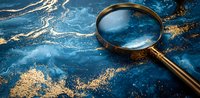 Vintage magnifying glass on dark blue and gold marble texture background, luxury detective concept for business investigation and research.